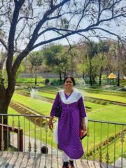 Nitya T