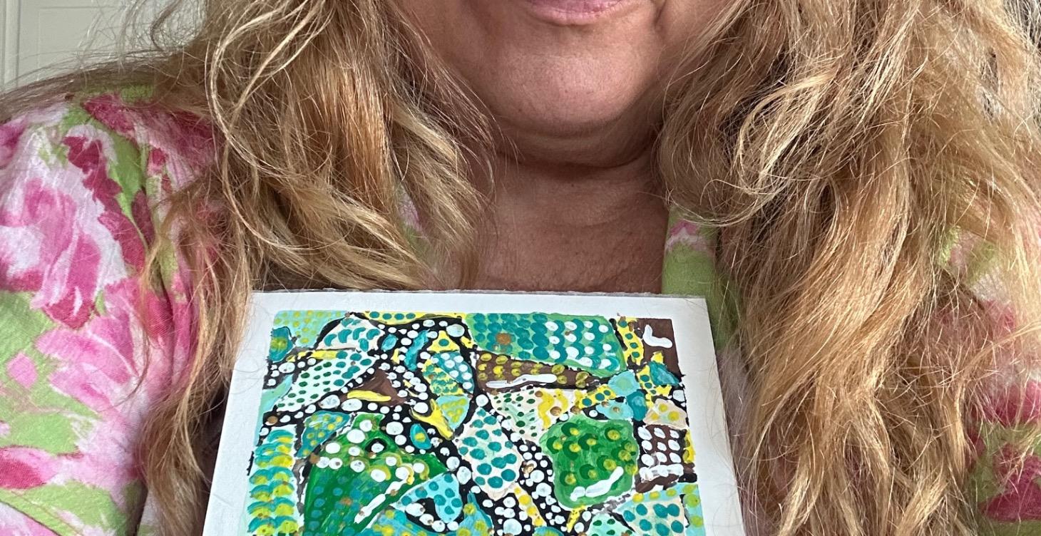 Abstract acrylic art using marbles