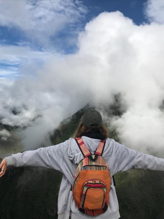 J B