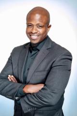 Dr. Karim R. Ellis