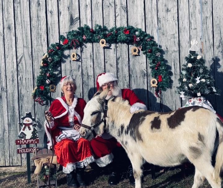 Winston with Mr. and Mrs. Claus