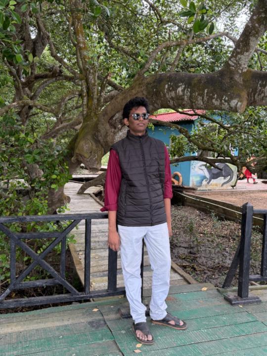 Karthik B