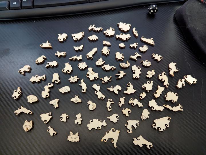 Wooden dragon puzzle - what do you see?