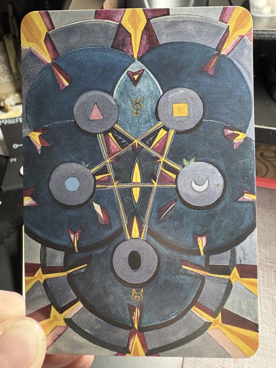 July Tarot Card 5 of Disks 