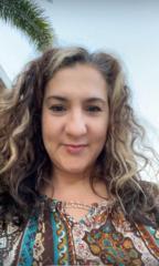 Migdalia De La Garza