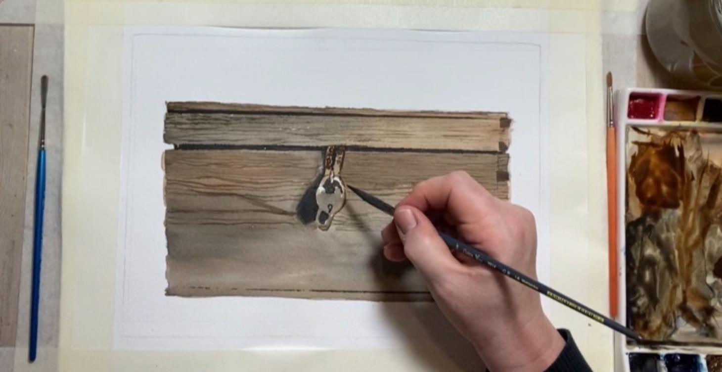 Måla en antik trälåda med rostigt lås