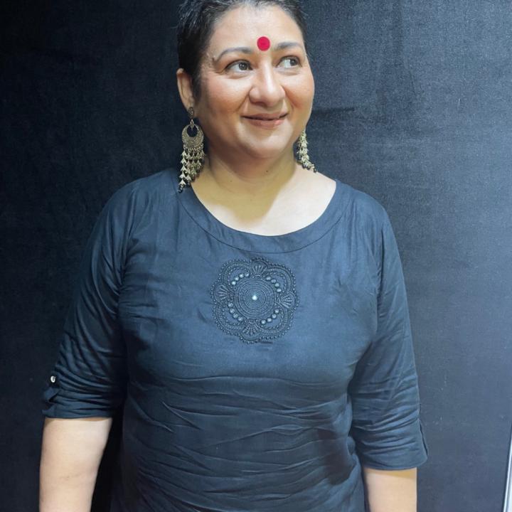 Nidhi B