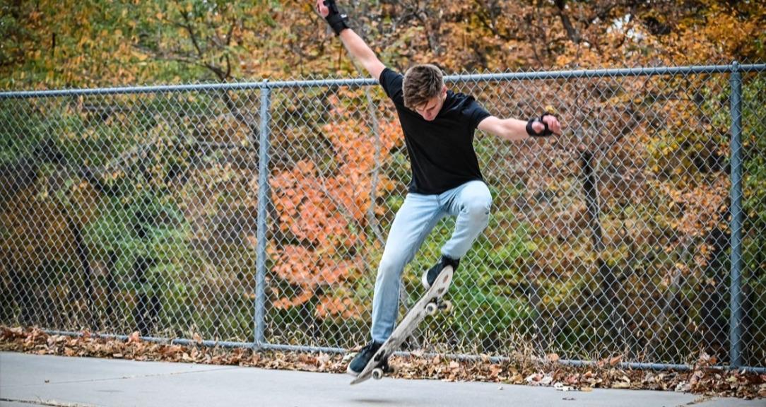 Kicking flips Skateboarding