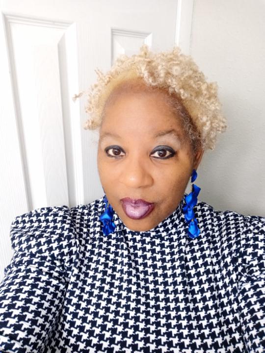 Andrea M Riley