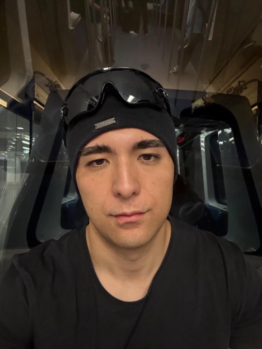 T J