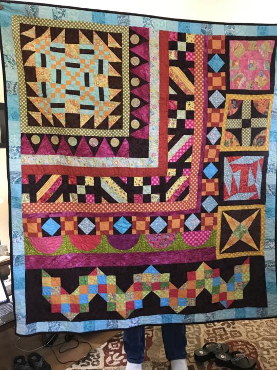 I love to quilt....  Here are few of mine and I'd love to see a few of yours too!