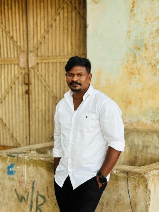 Parthiban B