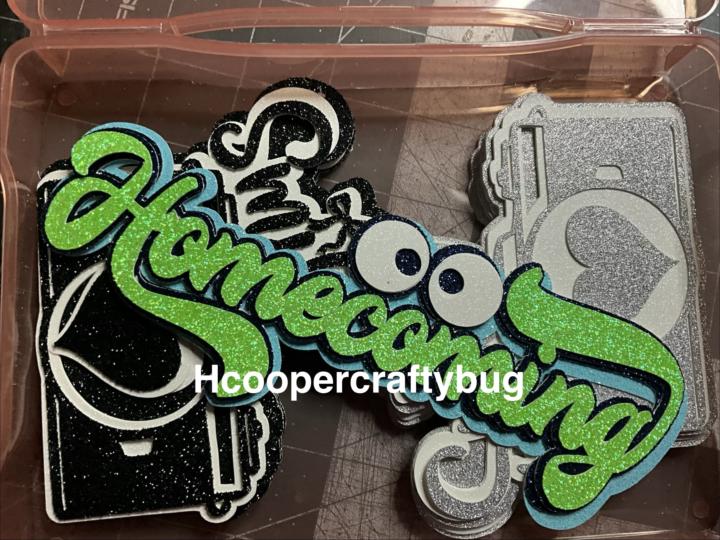 Cut out a homecoming cutout for mystery mum box. I incorporated the frogs eyes