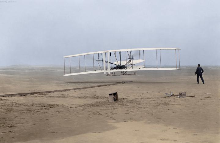 How did the Wright Flyer take off and land?