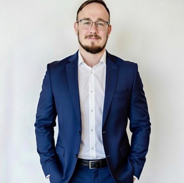 J L