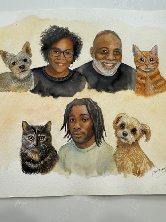 Retrato familiar incluyendo los peluditos.