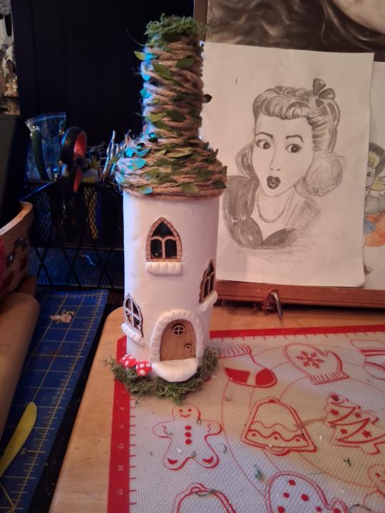 Wine bottle fairy house