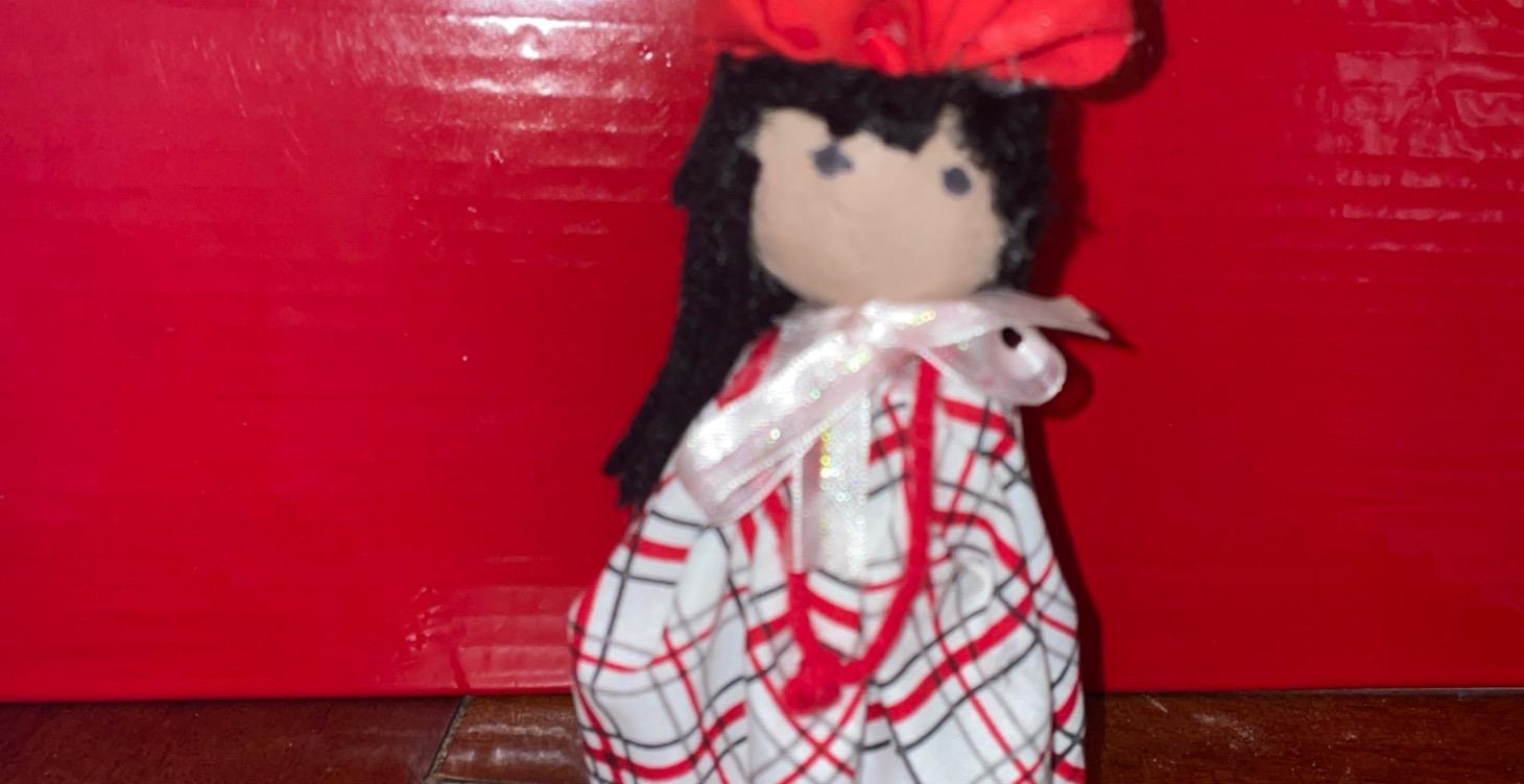 Demonstration on how to construct a vintage doll