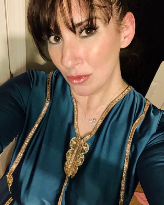 Reena Zrouq