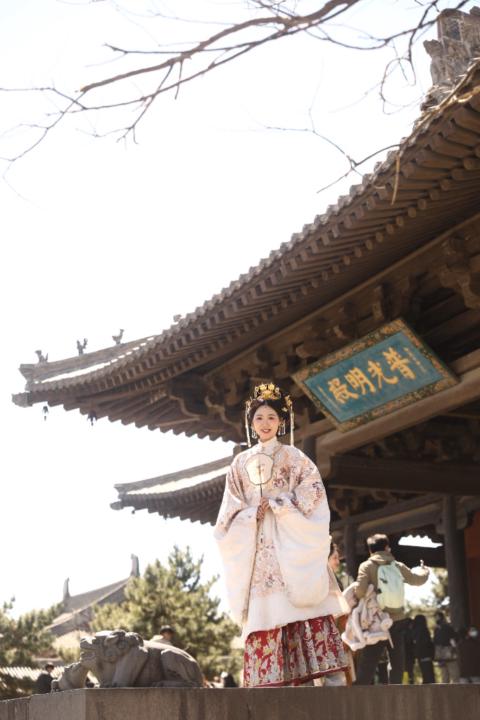 Yuqing Huang
