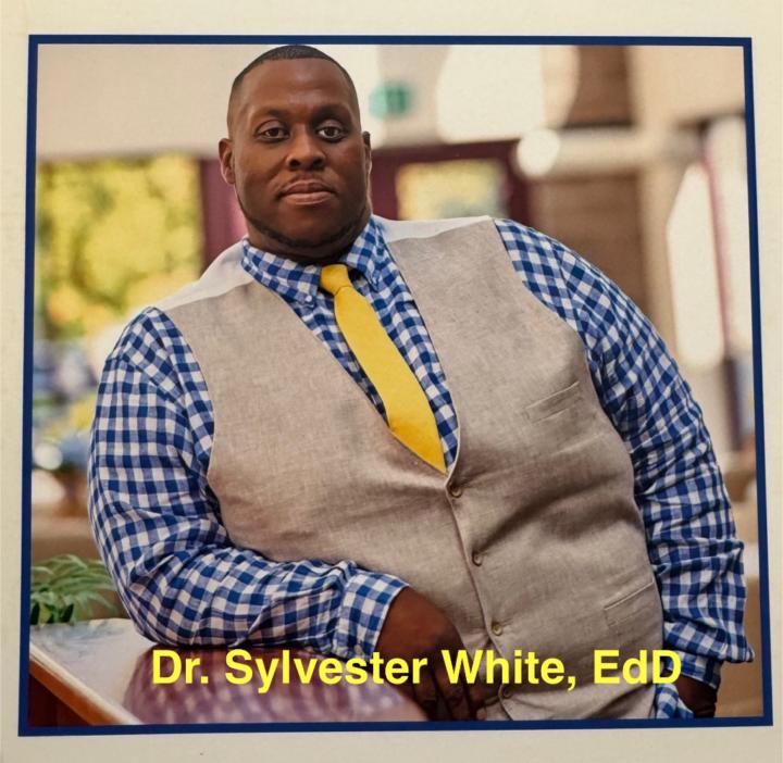 Dr. Sylvester White