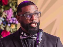 Dr Johné Battle