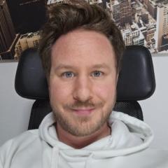 J B