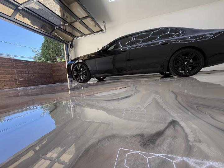 From inspiration pic to finished floor — custom color match + polyaspartic topcoat over metallic.