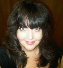 Theda M