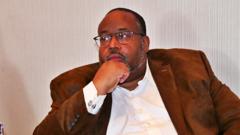 Dr R Harrison Baxter