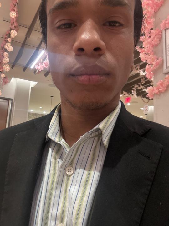 J E
