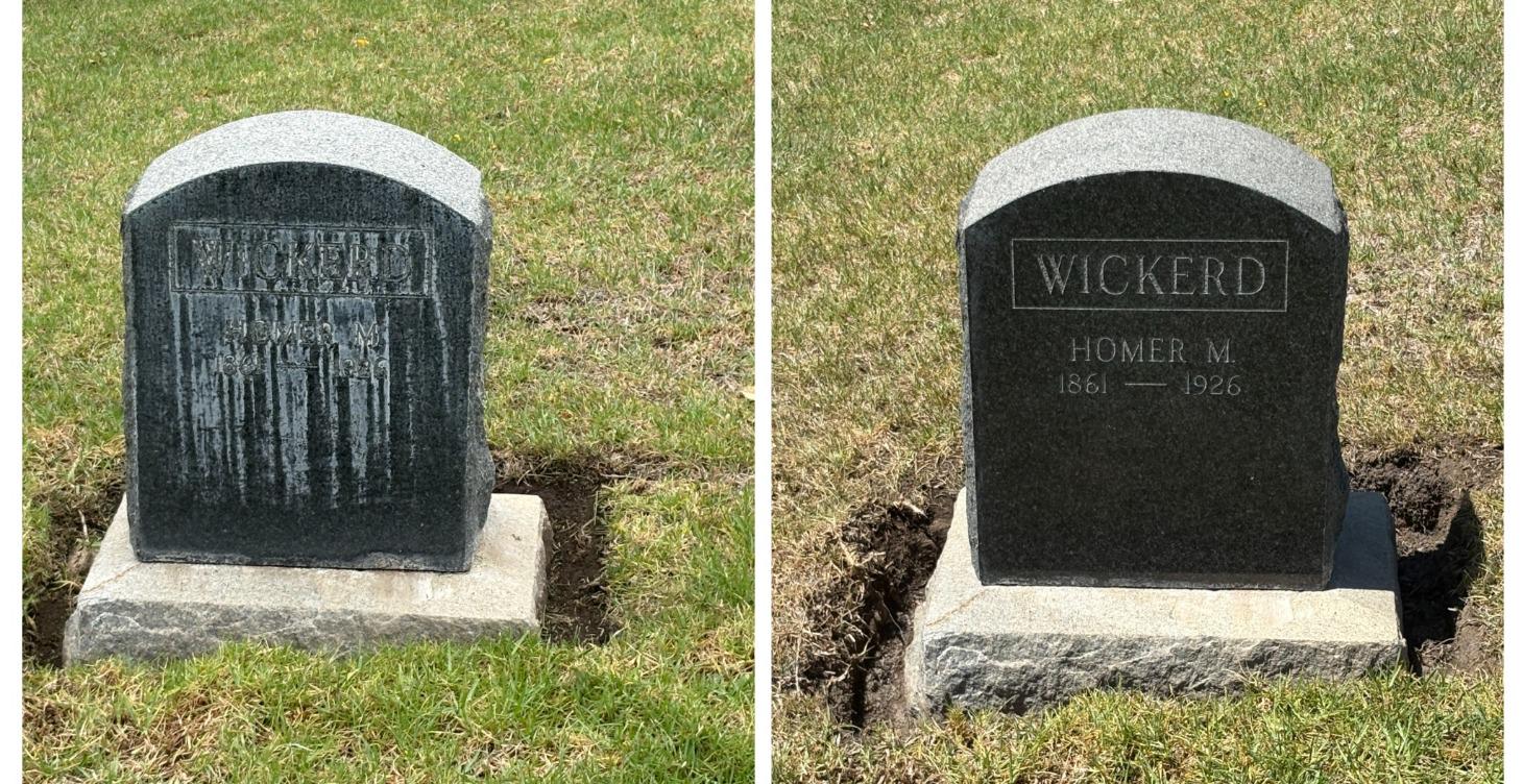 The cleaning of the headstone before the paint..