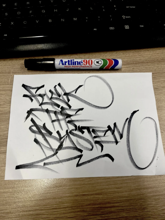 One of my First drawings when I was 17 years old. The Challenge of the day? Figure out what it says and comment below your interpretation. 