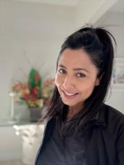 Nidhi T