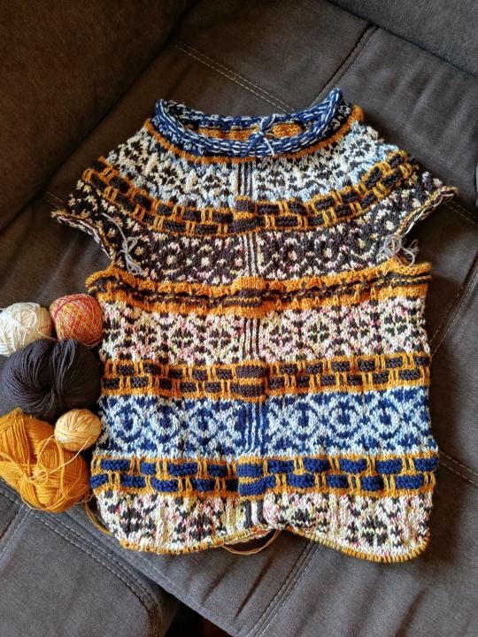 Still in Progress...but challenging myself with the very first time of knitting a Cardigan and at the same time my very first time of knitting color work 