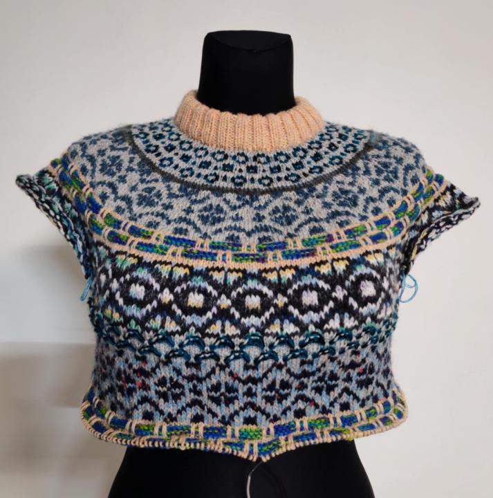 Each piece is made from a different yarn. I could knit a whole village of sweaters from the leftovers.