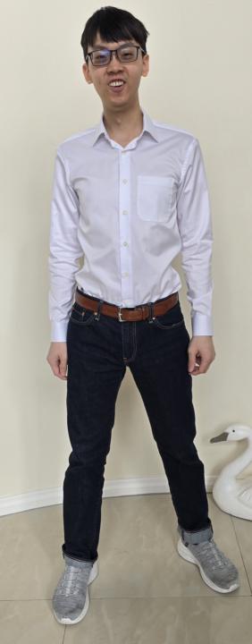 Do the sneakers match the formality of the entire outfit?