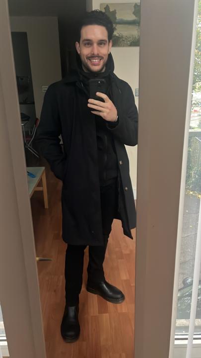 Rain overcoat… and Doc Martens for the Dr