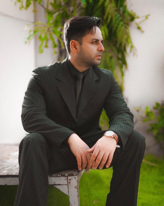 Moonis Khan