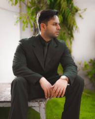 Moonis Khan