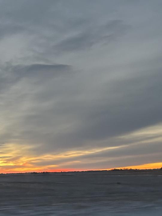 Peach Sunsets and snow / blizzard