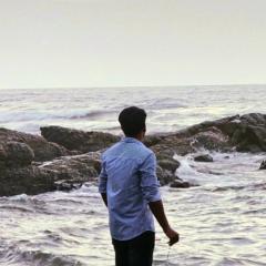 Dhiraj T