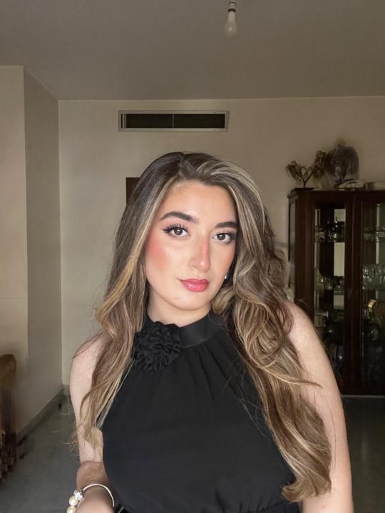 Nermine Assi
