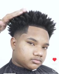 T M